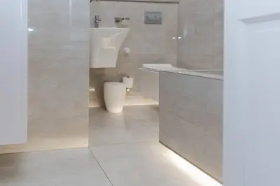 a bathroom with a sink and a toilet in it at Hatfield on Park A in Pretoria