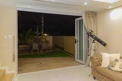 a camera in a living room with a couch at Hatfield on Park A in Pretoria