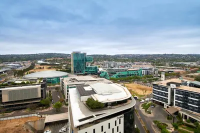 an aerial view of a city with buildings at When Away - Your Home Away from Home in Pretoria