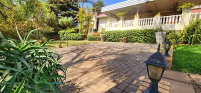 a brick driveway in front of a house at Harmony Suite in Pretoria