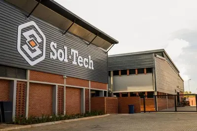 a building with a sign on the side of it at Harmony Suite in Pretoria