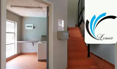 an open door to a hallway with a stairway at Leneir in Pretoria