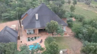 an aerial view of a house at Zebula Golf and Wildlife Estate - Bushveld Bliss Pax 14 - Moi Signature Luxury villa in Mabula