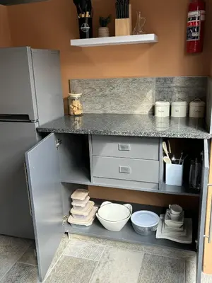a kitchen with a counter and a refrigerator at Vrede Luxury Tented Camp in Kosmos