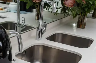 a kitchen with two sinks and two faucets at 2 Bed Luxury Apartment, Ellipse, Waterfall in Midrand