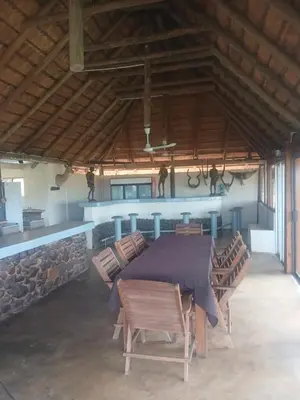 a large dining room with a table and chairs at Mbaula lodge in Letaba Wildlife Reserve