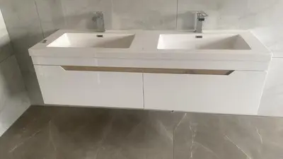 two sinks in a bathroom with white cabinets at 114 Zinnia in Midrand