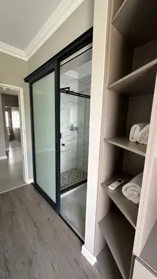 a walk in shower in a bathroom with a glass door at CELONIA VILLA Euphoria 442 in Naboomspruit