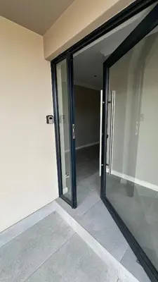 an open sliding glass door of a building at CELONIA VILLA Euphoria 442 in Naboomspruit