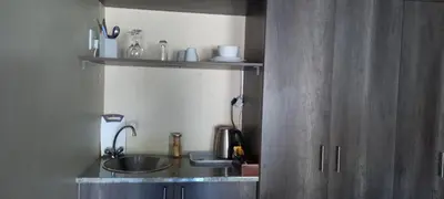 a kitchen with a sink and a counter top at Delutz Overnight Accommodation Room 1 in Polokwane
