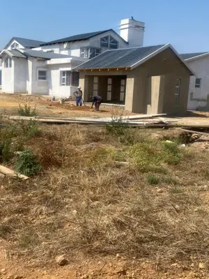 a man standing in front of a building at 114 zinnia place in Midrand