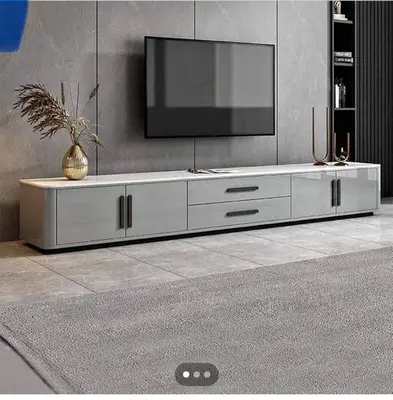 a large entertainment center with a television on a wall at 114 zinnia place in Midrand