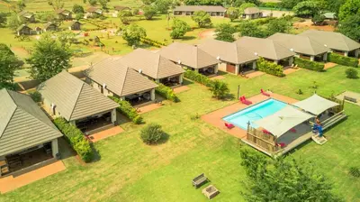 an aerial view of a house with a swimming pool at Kruger View Chalets in Malelane