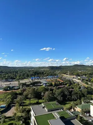 an overhead view of a city with a tennis court at Menlyn Maine Golden Sands in Pretoria