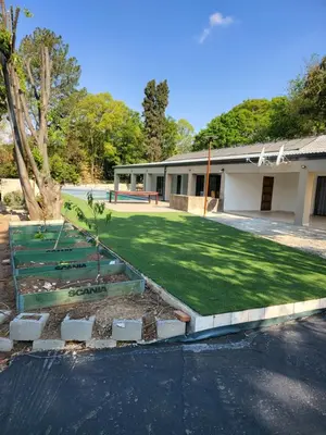 a yard in front of a building at Limewood super Deluxe in Sandton
