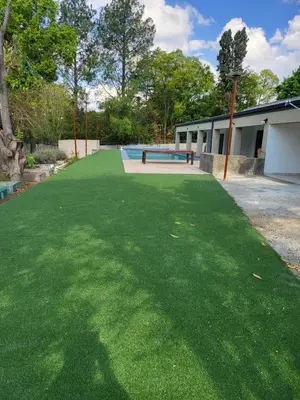 a large grassy yard with a skate park in the background at Limewood Vintage in Sandton