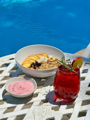 a table with a bowl of food and a bowl of fruit at Guesthouse 52 in Groblersdal