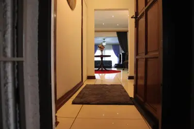a hallway with a door leading to a room at Guest Home KS2E - Self Catering in Kempton Park