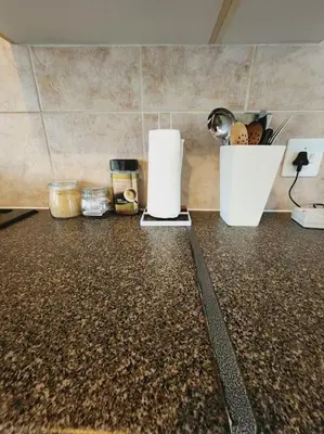 a counter top with various items on it in a kitchen at 2b - 74 No load shedding - 2 bed home in Centurion