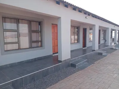 a row of windows on the side of a building at Elangeni Guest House in Mahubahuba