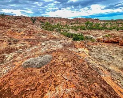 an aerial view of a large rock in the desert at Kaoxa Bush Camp in Alldays