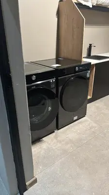a washer and dryer sitting in a room at Golden Treasure - OFF GRID in Witbank