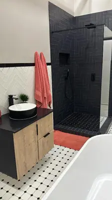 a bathroom with a sink and a shower at Golden Treasure - OFF GRID in Witbank
