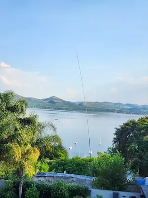 a view of a body of water with boats in it at Mountain Dreamers in Hartbeespoort