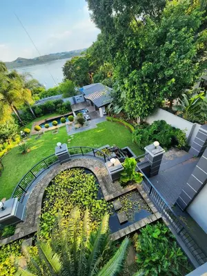 an aerial view of a house with a garden at Mountain Dreamers in Hartbeespoort