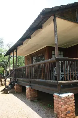 a porch of a house with a roof at Grootgeluk in Naboomspruit