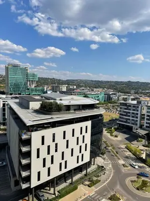 an overhead view of a building in a city at El Mayor Deluxe Suite MENLYN MAINE in Pretoria