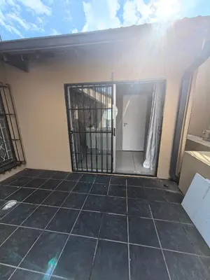 a room with a gate on a house at Selina Guesthouse in Kempton Park