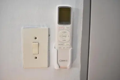 a cell phone is hooked up to a door at 39 on Clarendon in Graskop