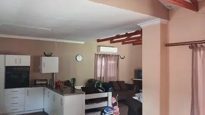 a room with a kitchen and a living room at 329 on 30th Avenue Villieria Juane in Pretoria