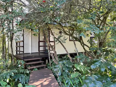a tree house in the middle of a garden at Eindelik on Setlaars in Graskop