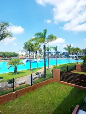 a view of a swimming pool at a resort at The Blyde 1471 in Pretoria