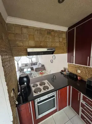 an overhead view of a kitchen with a stove at Bananas Den in Sandton