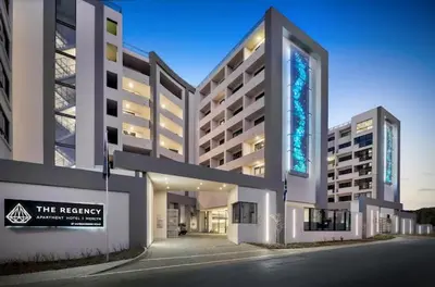 a large building with a sign in front of it at 522 The Regency Menlyn in Pretoria
