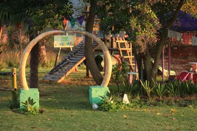a park with a playground with a slide at The Seed Pod Guesthouse in Haningfontein