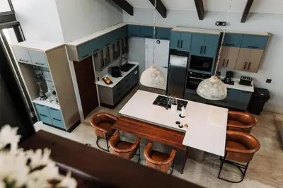 an overhead view of a kitchen with a table and chairs at Idyllic Kruger Breeze Marloth Park - 4 Bedroom in Marloth Park