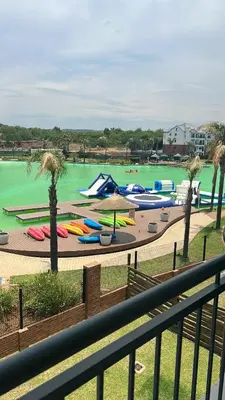 a water park with a bunch of inflatable boats at The Blyde Crystal Lagoon - 3 Bedrooms with Lagoon Views in Pretoria