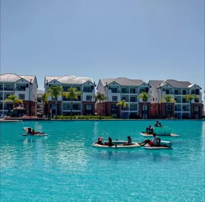 a group of people in canoes in the water at The Blyde Crystal Lagoon - 3 Bedrooms with Lagoon Views in Pretoria