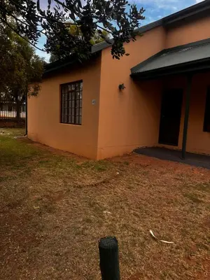 a building with a window on the side of it at 49 Bela-Bela Pendleberry Grove Holiday Unit 49 in Warmbaths