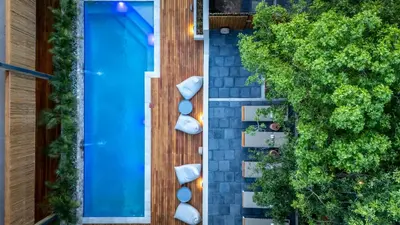 an overhead view of a house with a blue door at Khiwane Boutique Hotel in Hoedspruit