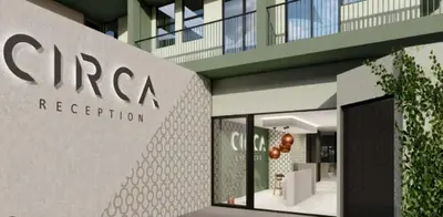 a building with a sign for a spa reception at Circa Aparthotel by unit 187 in Pretoria