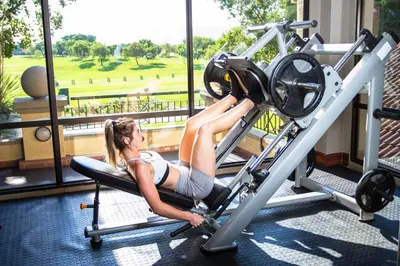 a woman on a reformer in a gym at Pecanwood Paradise in Hartbeespoort