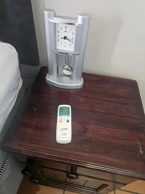 a table with a blender and a phone on it at American horses in Pretoria
