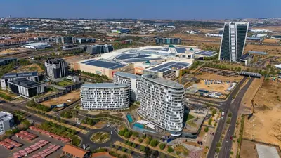 an aerial view of a city with tall buildings at Bhonsane Executive Suite, Ellipse, Midrand in Midrand
