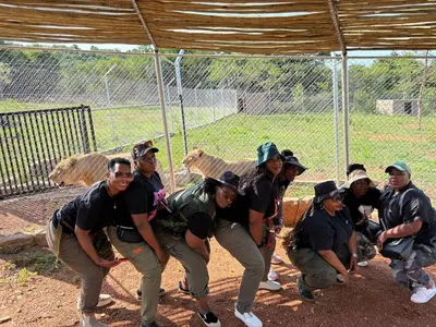 a group of baseball players posing for a picture at Zabini Lodge and Game Drives in Nelspruit