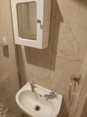 a bathroom with a sink and a mirror at American horses 2 in Pretoria